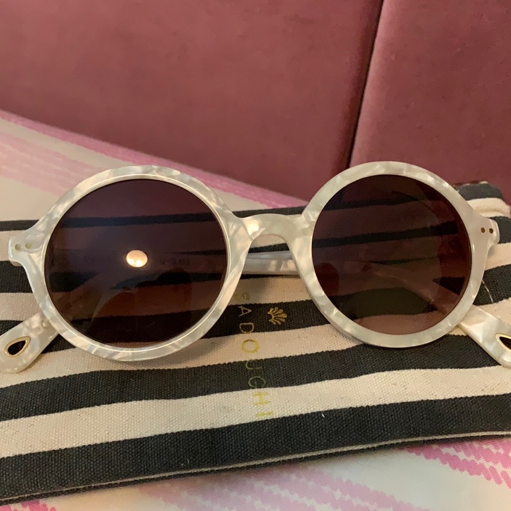 Lele Sadoughi mother of pearl east village round